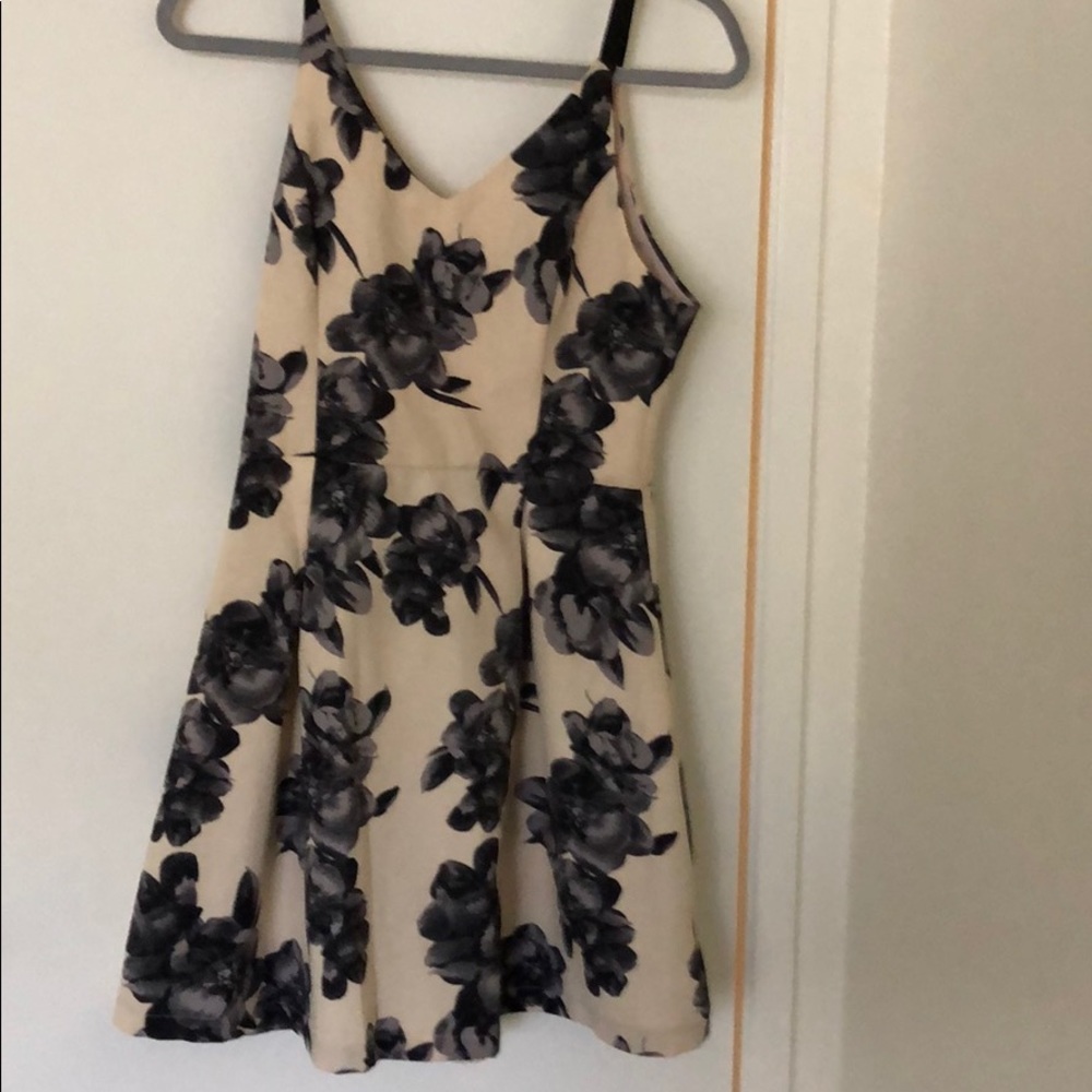 Cream dress with navy flowers. Size: M.